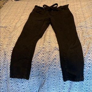 Black paper bag skinny jeans.